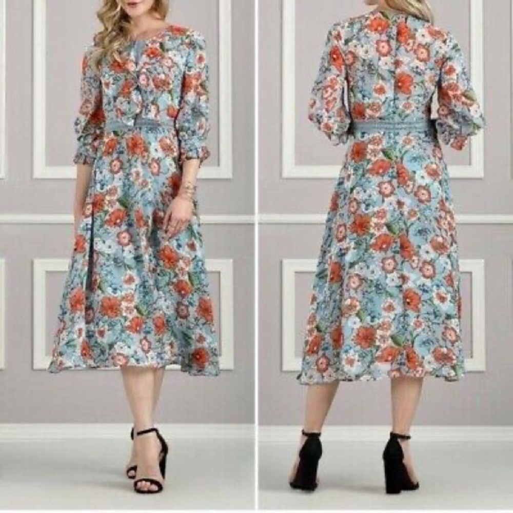 Suzanne Betro ladies’ NWT sz 4X dress. Lined floral print with blue background.